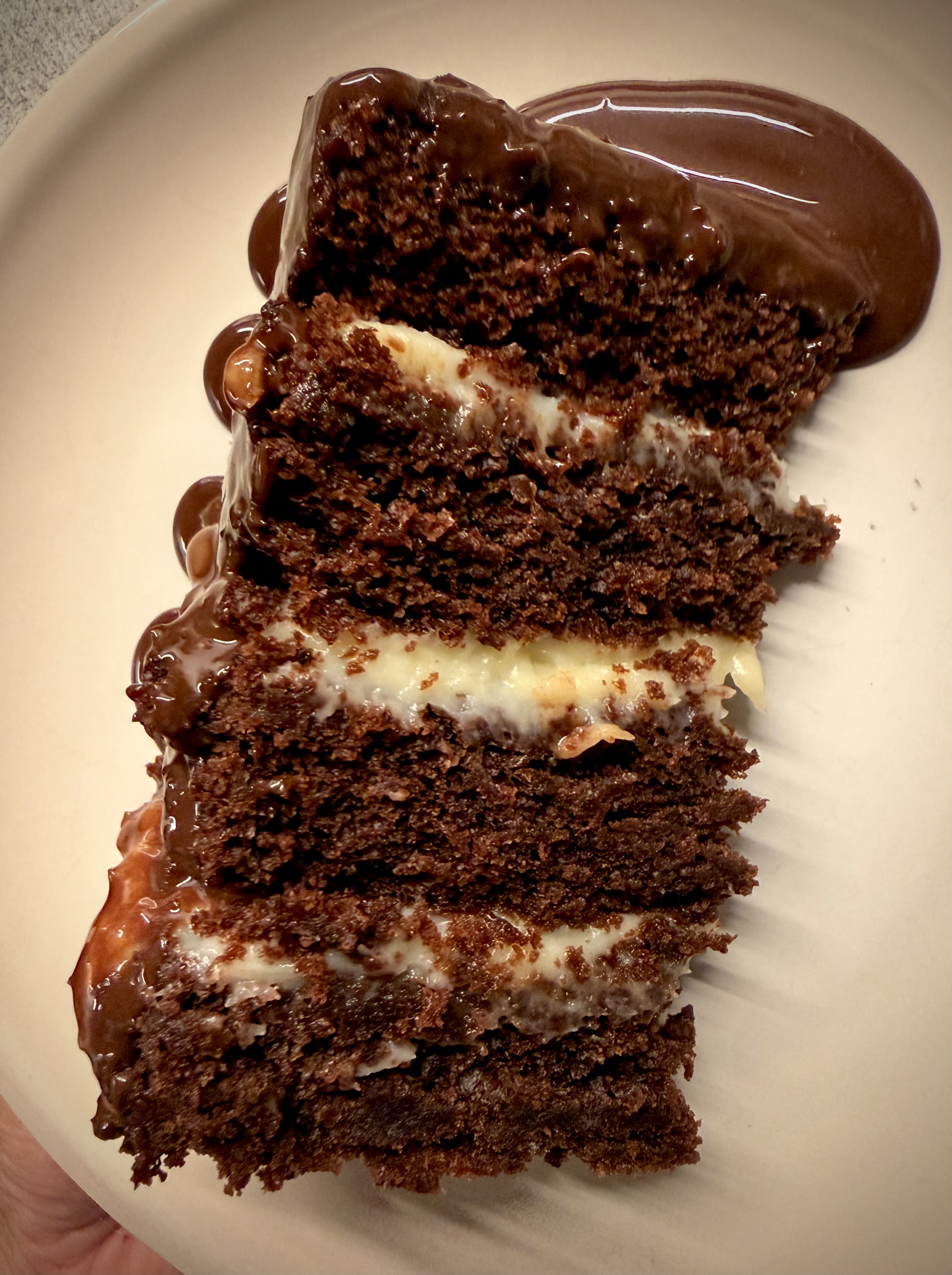 Moist chocolate cake with custard filling and chocolate fudge frosting